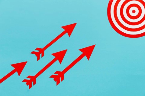 Arrows pointing dartboard center