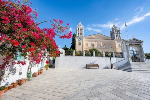 Church of Agia Triada with red bougainvillea