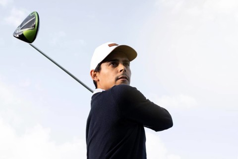 Low angle man with golf club