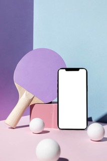 Front view ping pong balls paddle with smartphone