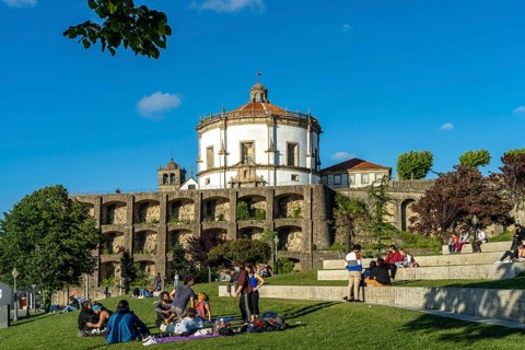 Young people in the Jardim do Morro park and the Mosteiro da Serra do Pilar monastery