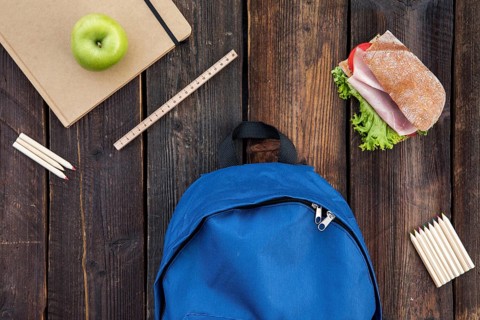 Schoolbag sandwich stationery table