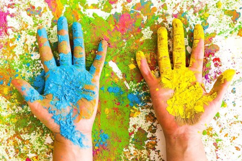 Hands blue yellow colors bright dry colours