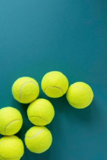 Top view new tennis balls with copy space