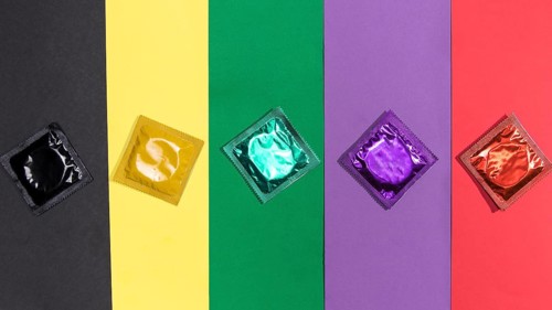 Top view condoms same colour background