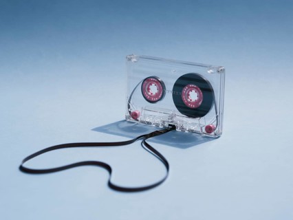 Close up shot clear cassette tape gradient background