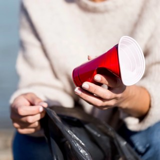 Close up plastic cups seaside