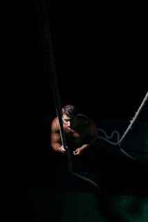 Crossfit concept with man pulling tow