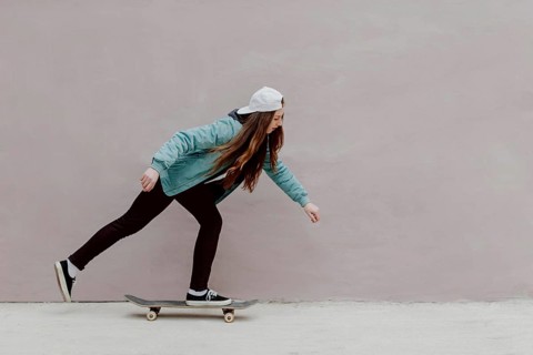 Skater girl riding her skateboard