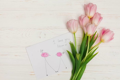 Flowers bunch child drawing wooden desk