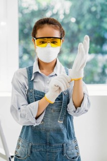 Woman with safety protection equipment