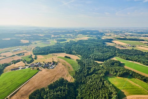Aerial view over the fields and forests near Woerth an der Donau
