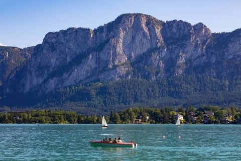 Electric boats on Lake Mondsee with Drachenwand