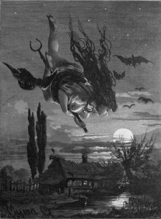 Witch flying through the night on a staff