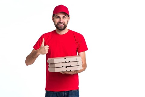 Delivery pizza boy holding boxes thumbs up copy space