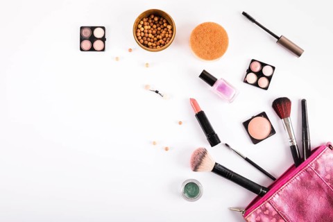 Different makeup cosmetics brushes white background
