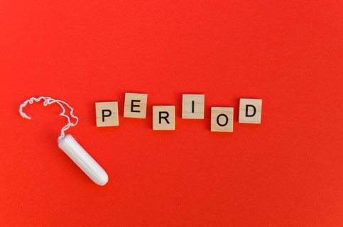 Period word with scrabble letters tampon