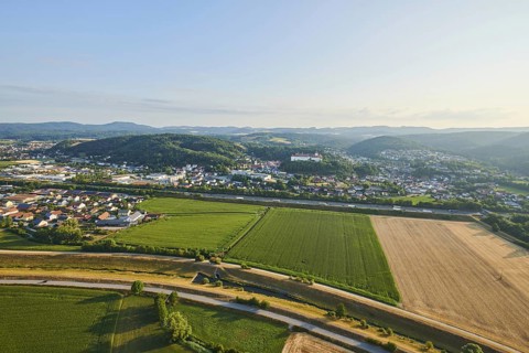 Aerial view over the fields and forests to the castle in Woerth an der Donau