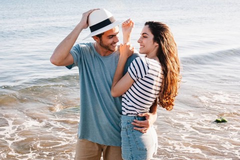 Young couple love beach