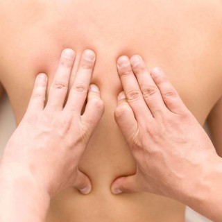 Close up hands massaging client