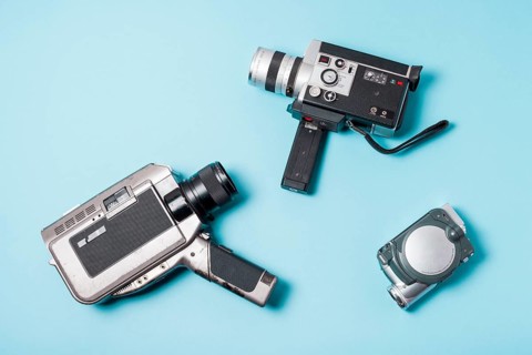 Different type camcorder blue background