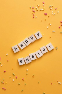 Top view happy easter greeting made out scrabble