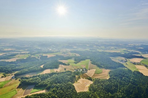 Aerial view over the fields and forests near Woerth an der Donau