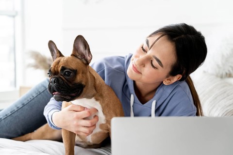 Medium shot girl looking dog