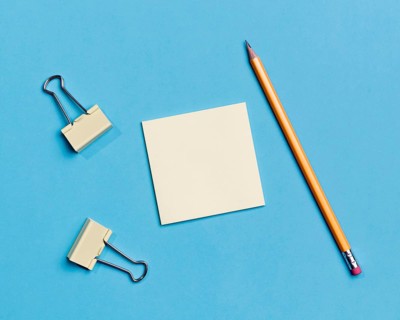 Top view paper clips pencil desk