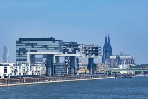 City view of the Rheinauhafen in Cologne with the 3 crane houses