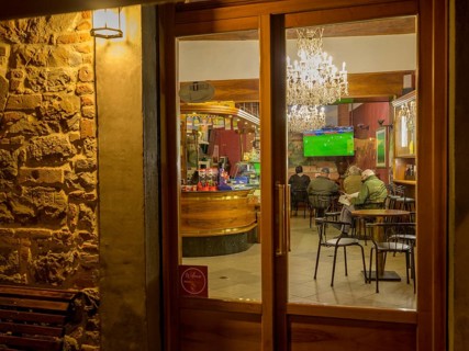 View of a restaurant in the old town in the evening