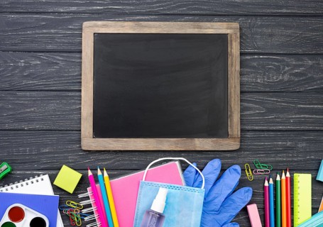 Top view back school stationery with multicolored pencils
