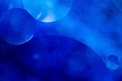 Mixing water oil coloured liquid abstract background_3