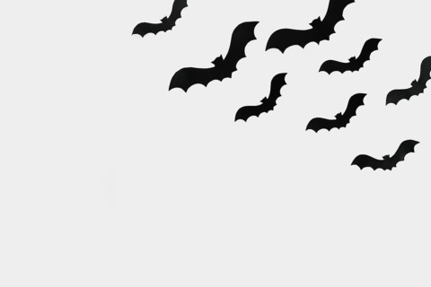Flying bats cut out paper