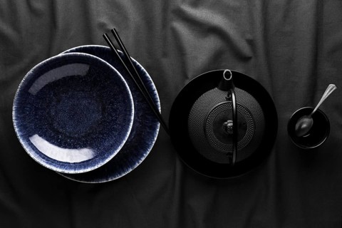 Top view teapot with dishware spoon