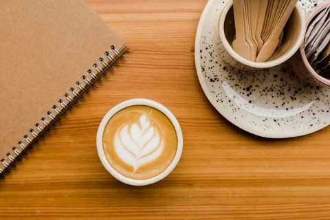 Top view desk with cup cofee