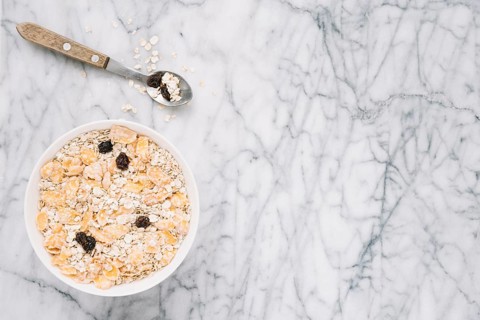 Oatmeal with raisins big bowl table