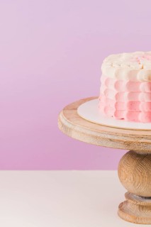 Close up birthday cake wooden cakestand