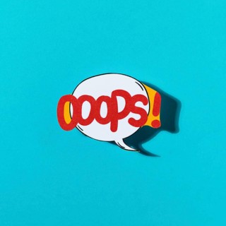 Pop art comic design oops speech bubble blue backdrop