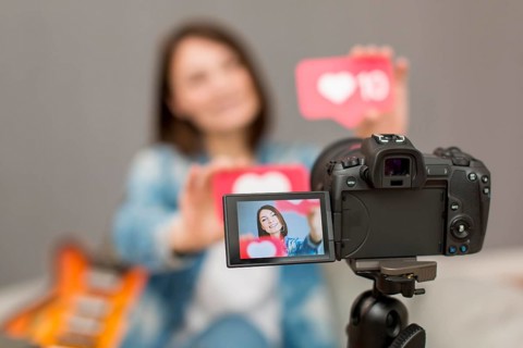 Close up camera tripod recording blogger