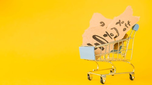 Shopping trolley with sale bits paper