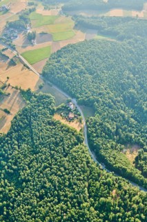 Aerial view over the fields and forests near Woerth an der Donau