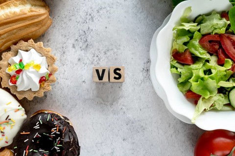 High angle view healthy vs unhealthy food concrete background