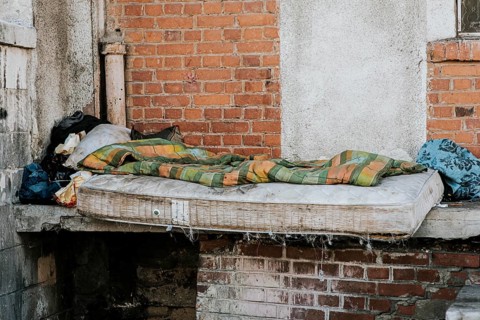 Front view mattress blanket homeless people
