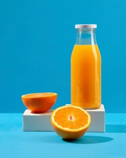 Orange juice fruit arrangement