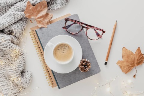 Top view coffee cup glasses agendas