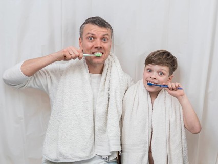 Father s day brushing teeth together