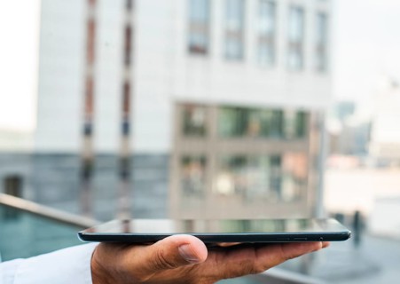 Business man holding tablet hand