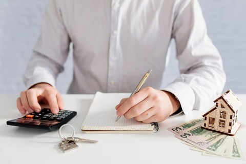 Crop person writing counting