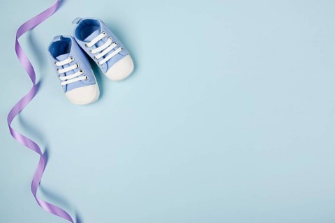 Blue ribbon shoes copy space